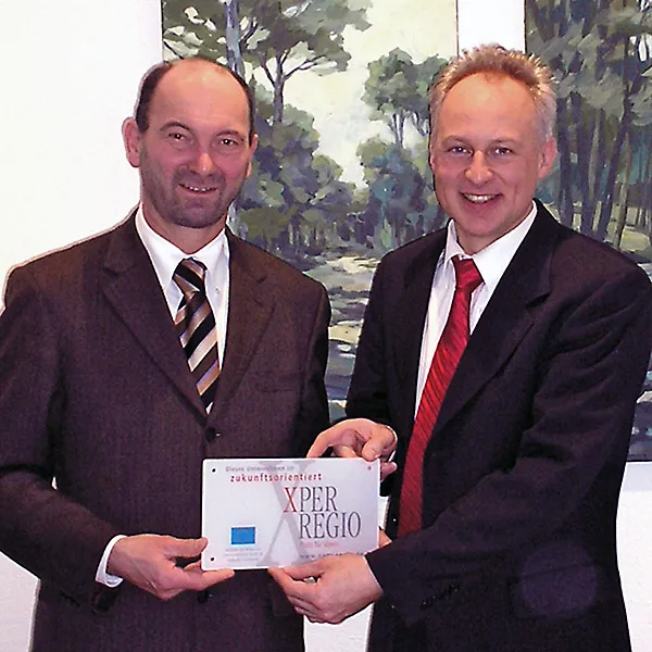Accepting XperRegio Award