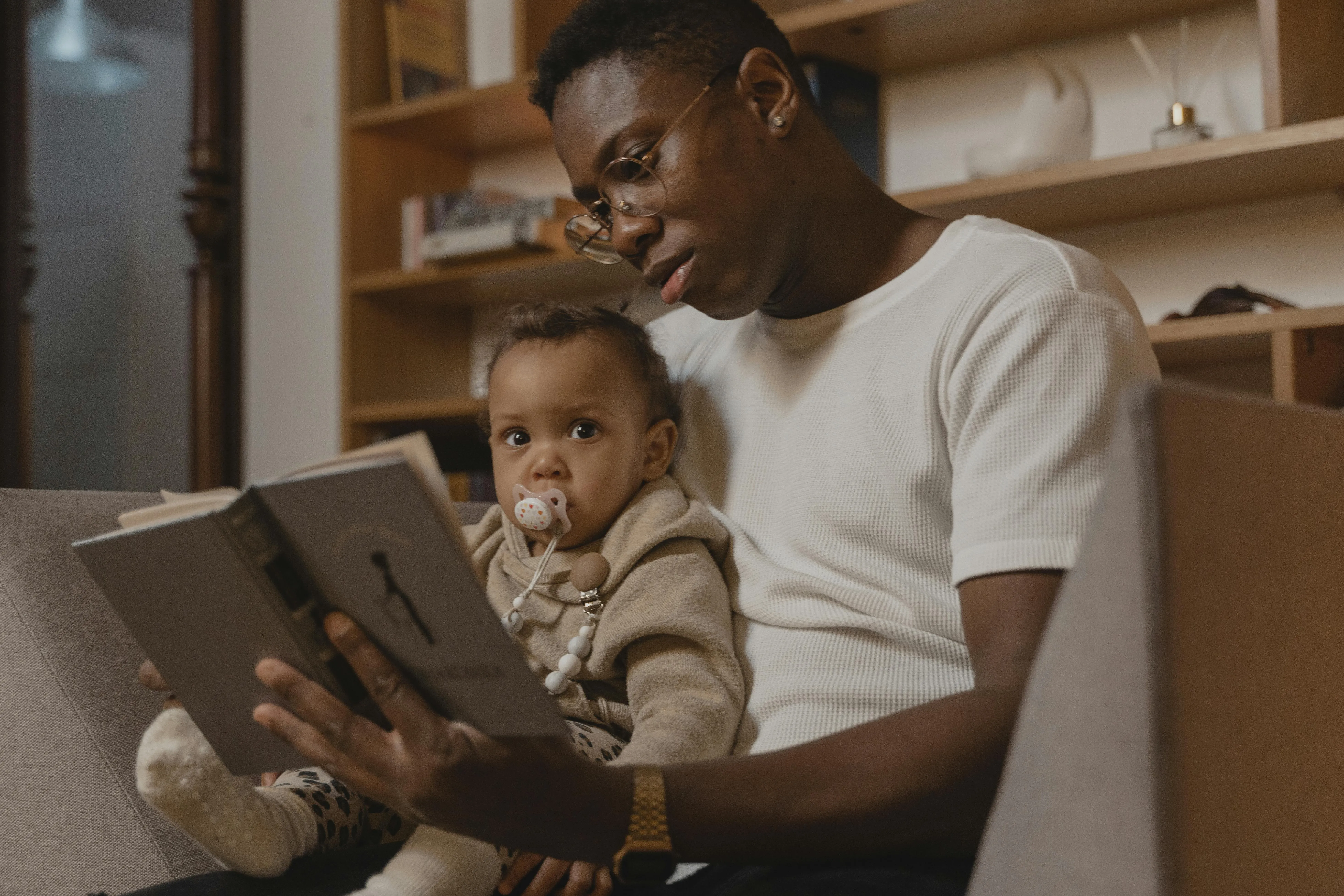 Father interacting with baby during hearing study