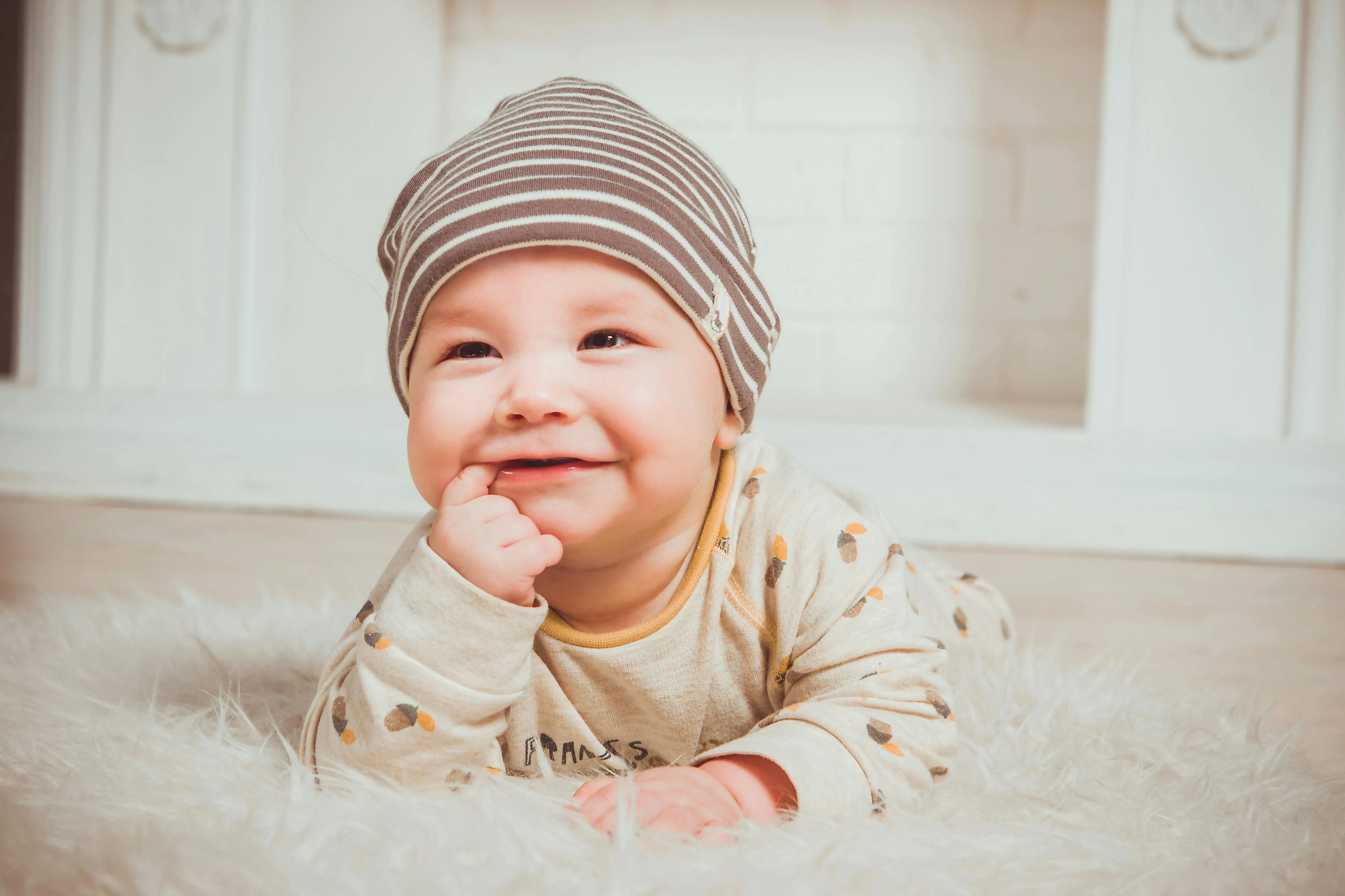 Baby playing with mother during behavioral research study