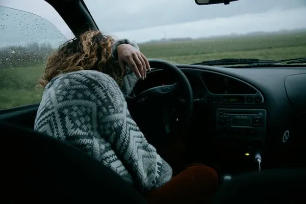 Driver showing signs of fatigue during long-distance journey