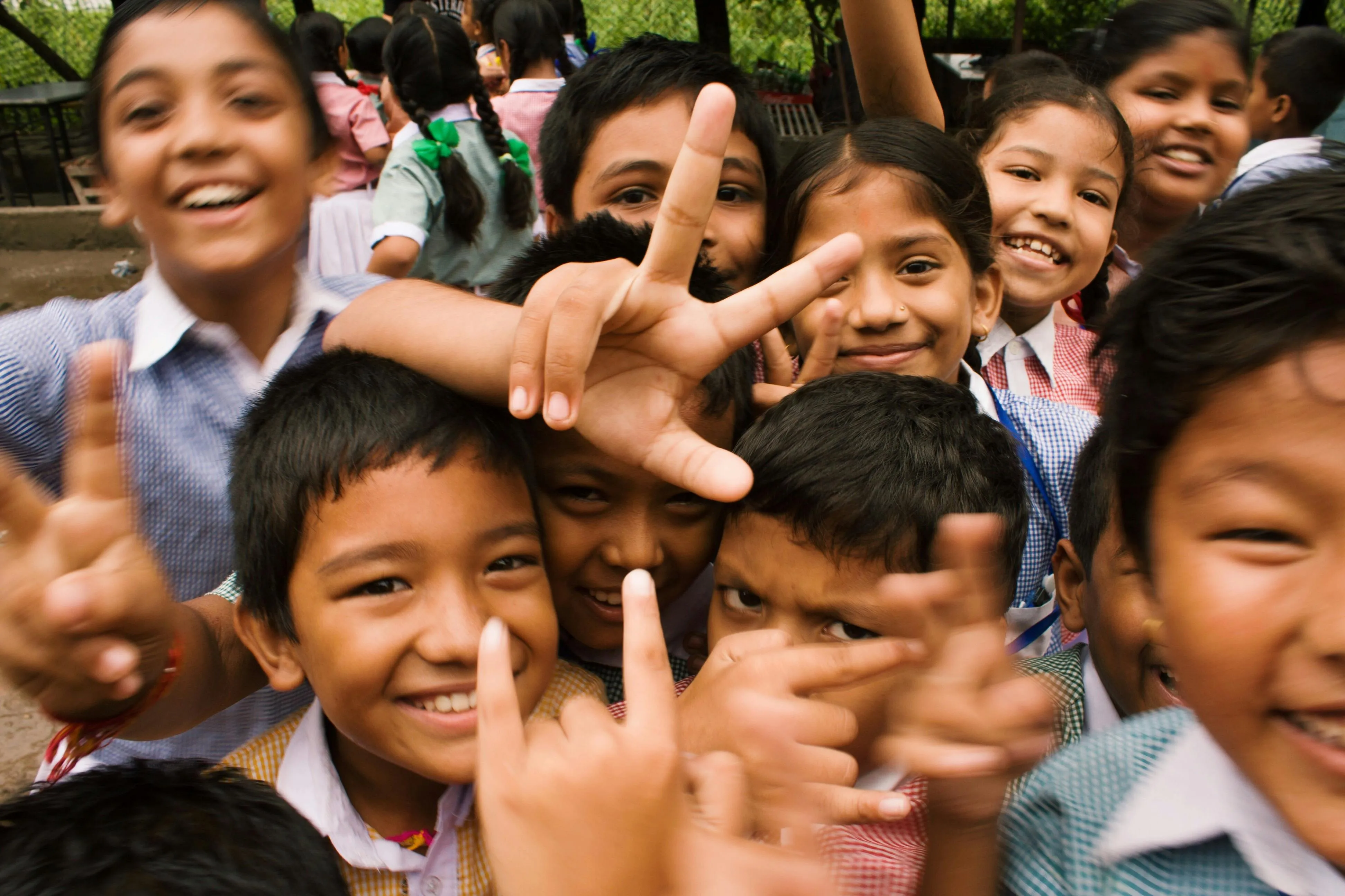 A group of happy children looking at the camera