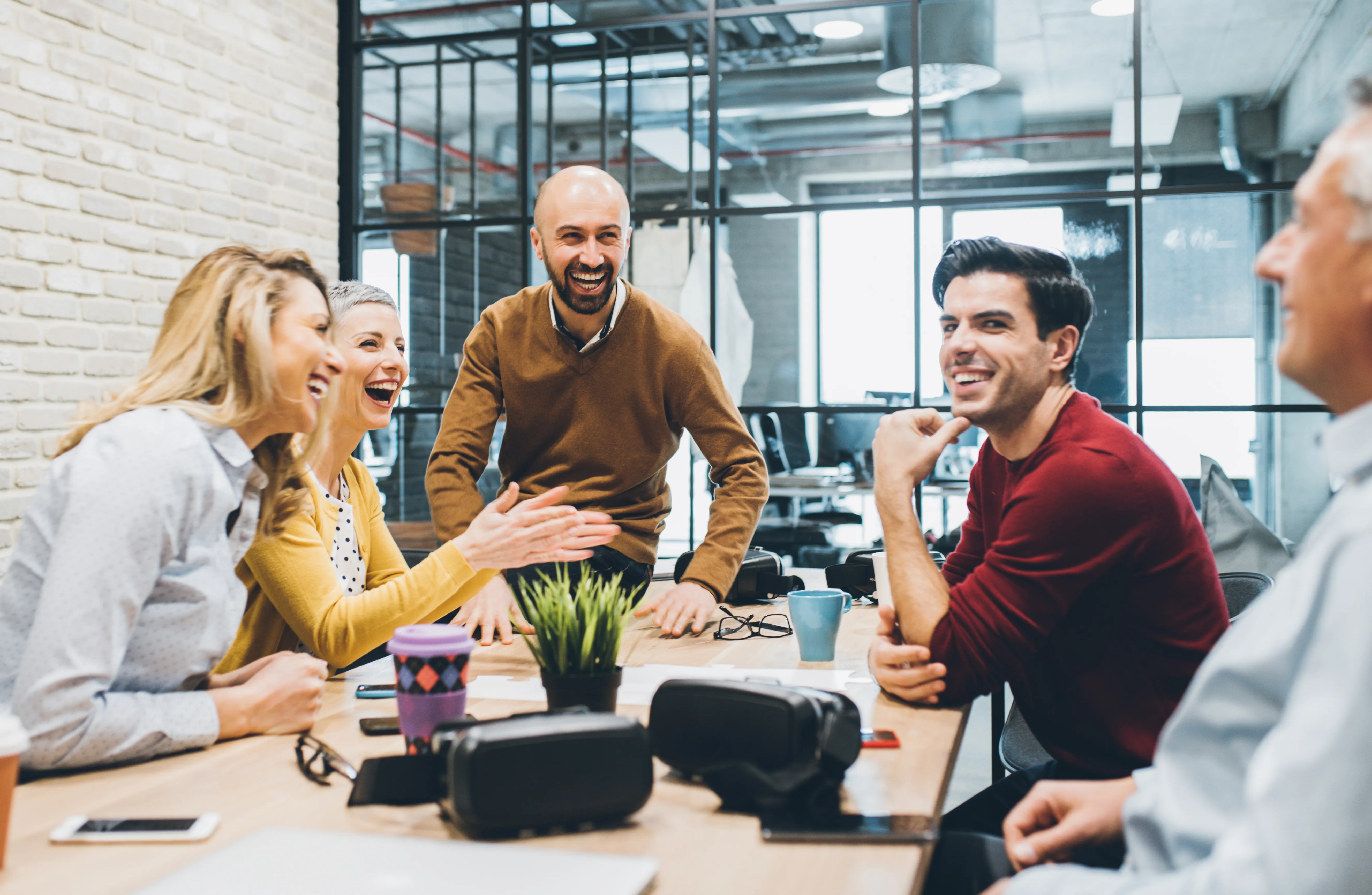 Team meeting showing positive interaction and humor