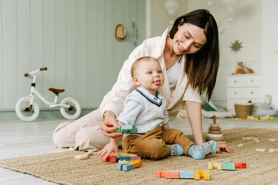 Study examining predictors of sensitive parenting among mothers with depression history, analyzing play and feeding interactions with 12-month-old infants using INTERACT