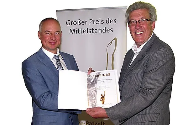 Pascal Mangold receiving Grand Prix Mittelstand Nomination Certificate